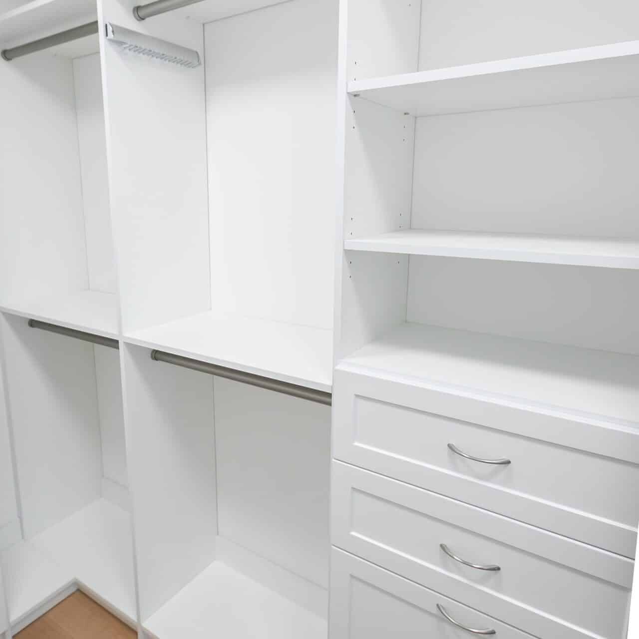 White closet system with long hang, adjustable shelves and drawers